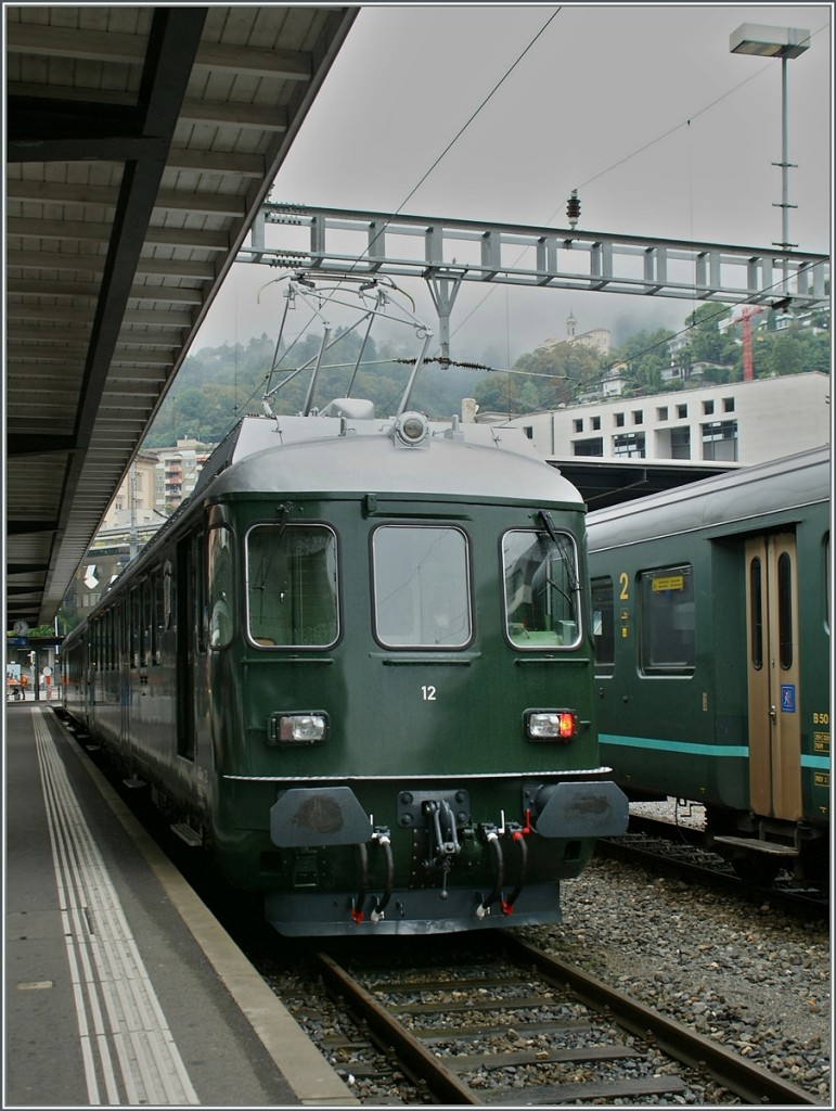 Der MThB ABDe 4/4 12 mit BDt 205 auf einer Sonderfahrt in Locarno. 
15. Sept. 2013