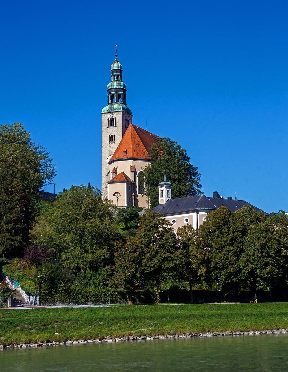 Die Mllner Kirche (Unserer lieben Frau Mariae Himmelfahrt, auch Augustinerkirche), liegt erhht am nrdlichen Auslufer des Mnchsberges in der alten Vorstadt Mlln in der Stadt Salzburg, hier am 12.09.2022. 