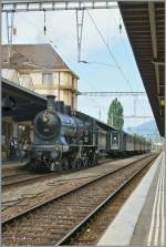 Die sch�ne A 3/5 705 man�vriert sich in Neuchatel an den Extrazug nach Murten.