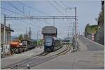 Der MOB GPX 4065 von Zweisimmen nach Montreux mit der schiebenden Ge 4/4 8004 muss in Chamby den Gegenzug abwarten.