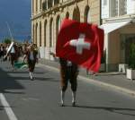 Fahnenschwinger beim Umzug in Vevey, anlsslich des zehnjhrigen Jubilums des Fete des Vignerons von 1999.
(28.08.2009)